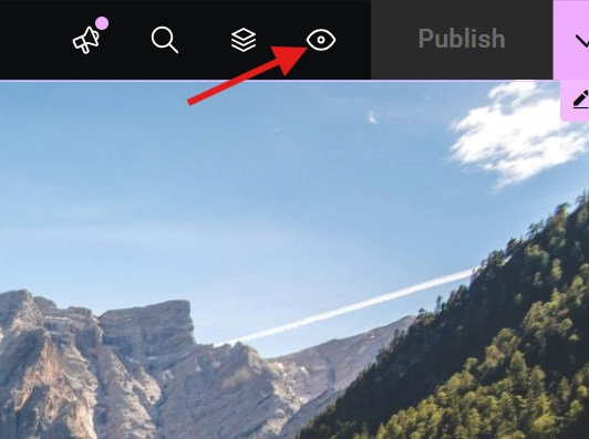 Website editor toolbar highlighting eye icon for preview mode next to publish button with mountain landscape
