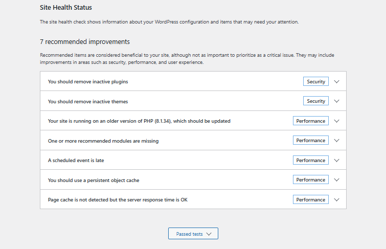 WordPress Site Health Status page listing 7 recommended improvements including PHP update and inactive plugins